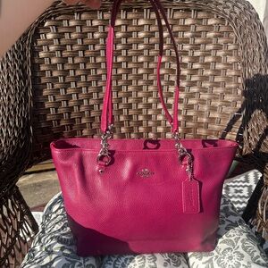 Coach tote purse. Pink/berry colored.